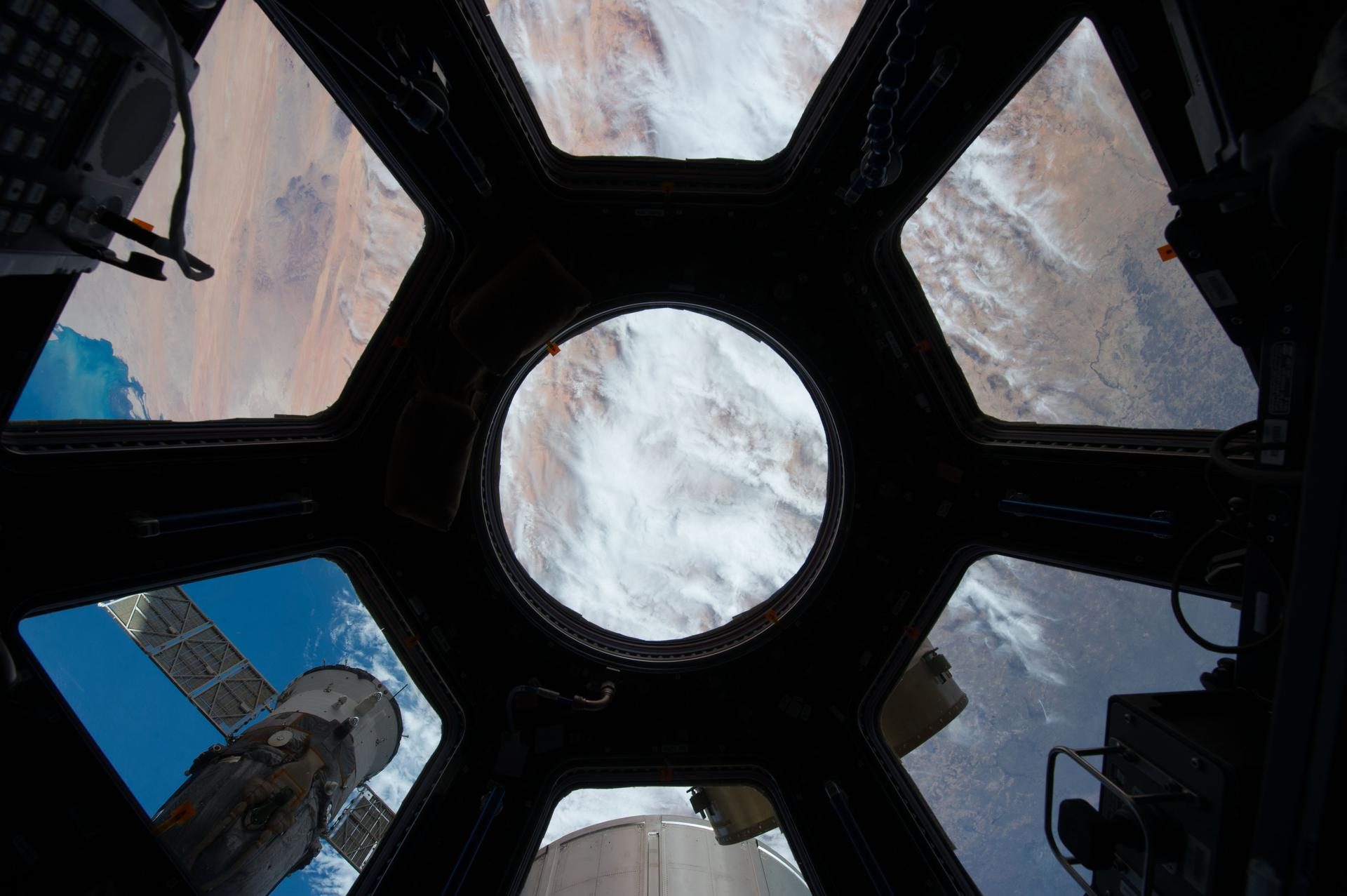 Earth seen through the seven windows of the ISS Cupola